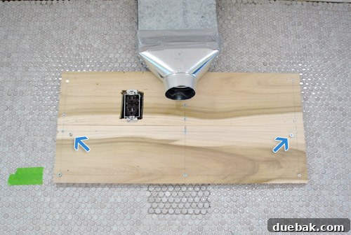 Two wood mounting planks on the wall for range hood and brackets