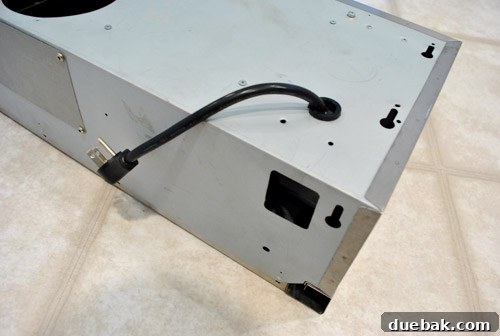 Measuring the wood plank for range hood mounting