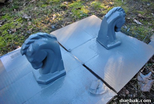 DIY Bookends: A Burst of Color 4 Close-up of the two ceramic horse heads, now uniformly primed in a steely gray color, awaiting their final colorful topcoat.