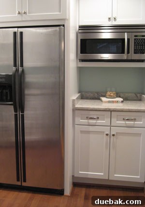 From Drab to Fab: Our Kitchen Renovation 5 Dedicated microwave nook with built-in cabinetry, maximizing corner storage in the kitchen