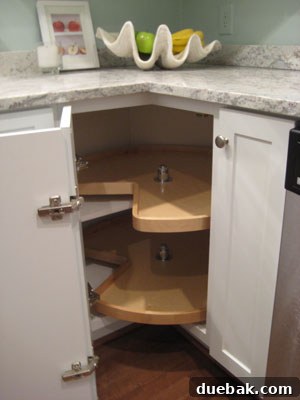 From Drab to Fab: Our Kitchen Renovation 7 Interior shot of a double-tiered lazy susan base cabinet, optimized for kitchen storage