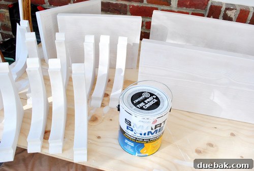 Assembled shelves and brackets laid out, primed and ready for final coats of paint.