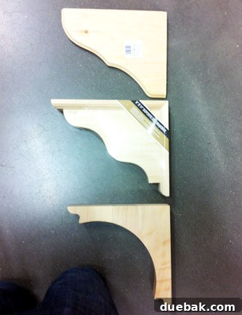 Three different styles of metal shelf brackets displayed, with one clearly favored for its design.