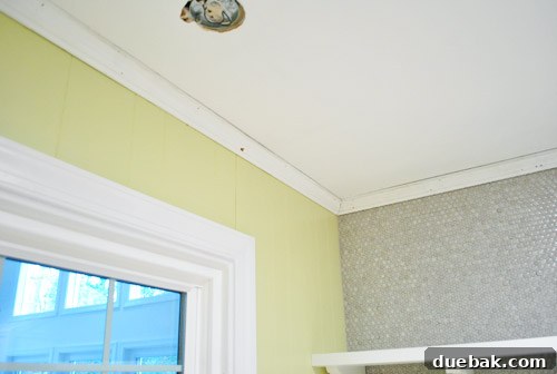 More crown molding pieces successfully installed in the kitchen