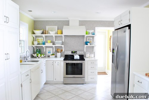 After crown molding installation, showing a smooth, finished ceiling line