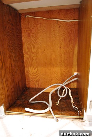 Cork planks placed in dishwasher space for height adjustment