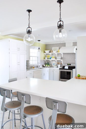 Pendant Light Makeover: Spray Painting Your Cord and Canopy 12 The new light fixture beautifully integrated into the kitchen design