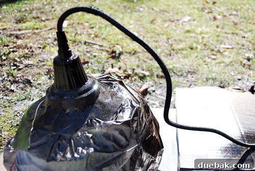 Pendant Light Makeover: Spray Painting Your Cord and Canopy 5 The light fixture after receiving its new oil-rubbed bronze finish