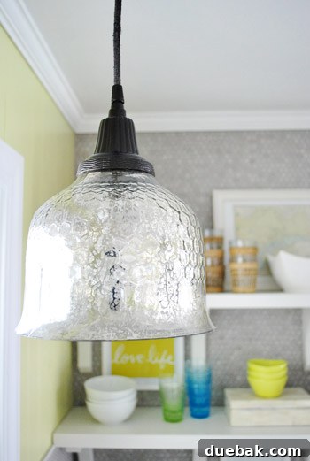 Pendant Light Makeover: Spray Painting Your Cord and Canopy 8 A closer view of the mercury glass shade and its reflection