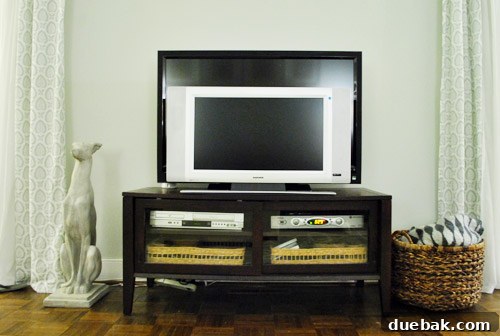 Elevate Your Entertainment 8 The new, larger television placed in the living room, showing its size compared to the space