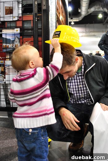 Clara playfully crowning her father as 'DIY Daddy of the Day' at the show