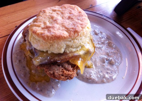 Pine State Biscuits' Chatfield sandwich, with biscuit, fried chicken, bacon, and apple butter