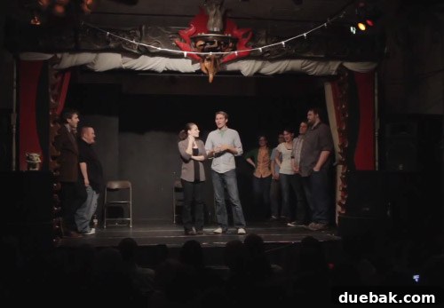 Audience enjoying an improv comedy show with laughter