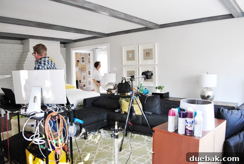 Behind-the-scenes of a home photoshoot with lighting equipment