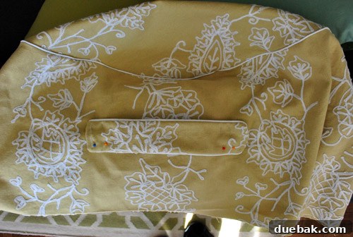 Partially piped beanbag with handle