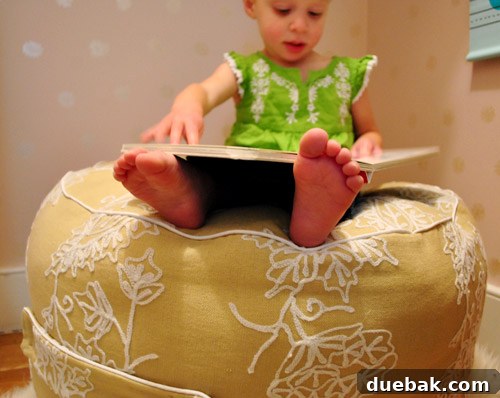 Toddler sitting on homemade beanbag