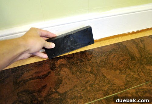 Working near the wall with cork flooring