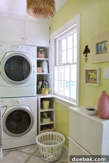 Laundry room with existing flooring before cork installation, showing a less inviting space.