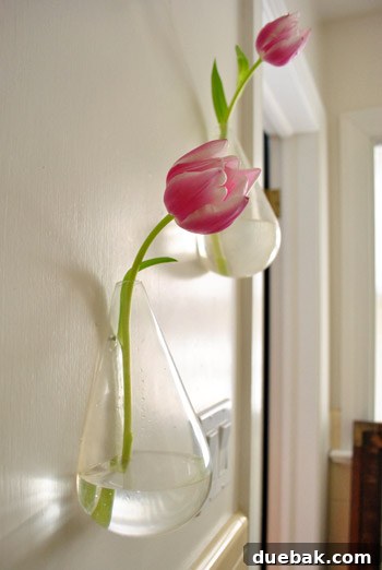 Sculptural Wall Vases 7 Guest bathroom scene showing a large mirror leaning against the wall, symbolizing ongoing home organization.
