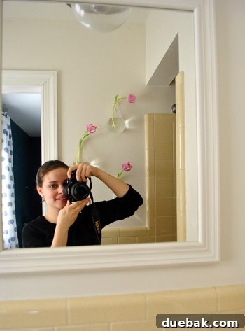 Sculptural Wall Vases 9 Playful pose in the guest bathroom, reflecting the lighthearted approach to home decor.