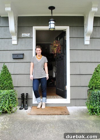 Kirsten and Kyle's elegant gray house exterior with oversized white corbels, showcasing classic Portland home architecture