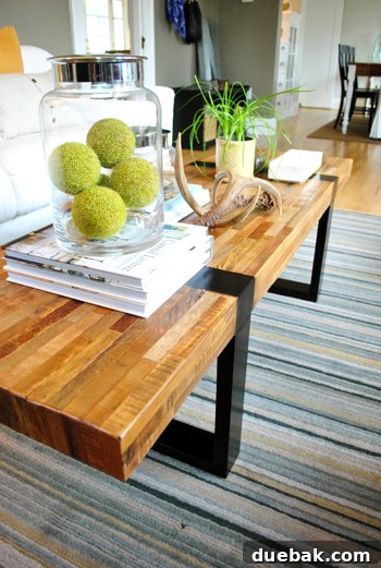 Elegant coffee table from Crate & Barrel, a cherished wedding gift, serving as a centerpiece in the living room