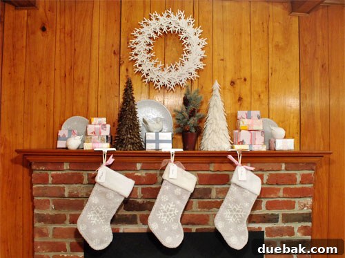Seasonal Mantel Decor: Christmas, Halloween, and Spring 2 Initial holiday decor on kitchen mantel with brick and paneling