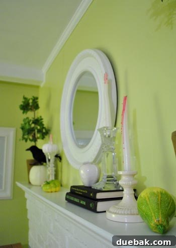 Seasonal Mantel Decor: Christmas, Halloween, and Spring 5 Halloween themed mantel decor with apples, spiders, and bleeding candles