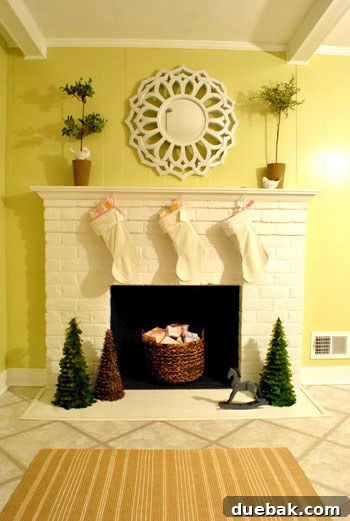Seasonal Mantel Decor: Christmas, Halloween, and Spring 7 Second Christmas decor on kitchen mantel with stockings and feather trees
