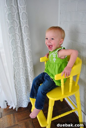 Giving an Old Wooden Highchair a Makeover 14 toddler showing dad new highchair