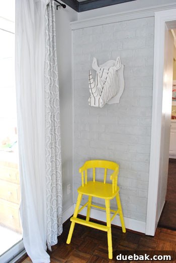 Giving an Old Wooden Highchair a Makeover 9 toddler seeing new yellow highchair