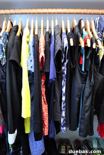 Hidden Bulletin Board Behind Clothes