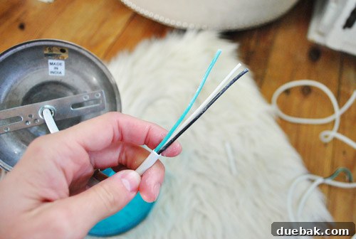 Upgrade Your Boob Light to a Modern Pendant 18 Exposed inner electrical wires of the pendant light after shortening the cord.