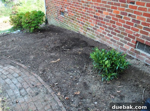 Clean and empty garden bed, ready for new plants