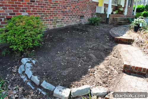 Clean and empty garden bed, viewed from the opposite side