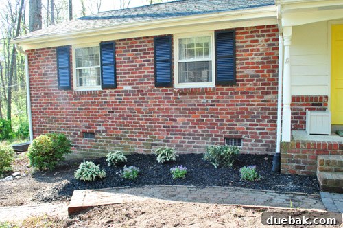 After photo of the largely completed left front porch garden bed
