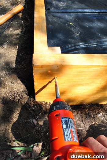 Attaching sandbox boards with screws