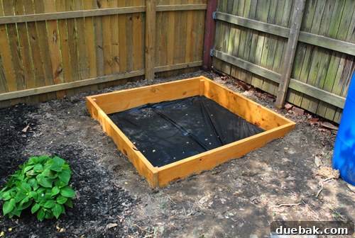 Completed wooden sandbox frame ready for its cover and sand