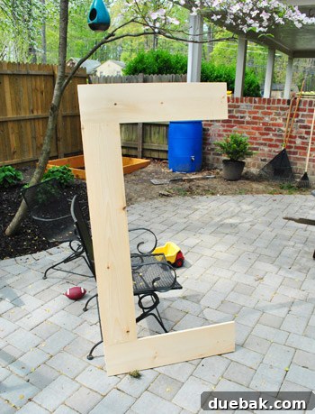 Wooden frame for one half of the sandbox cover, showing Kreg jig holes