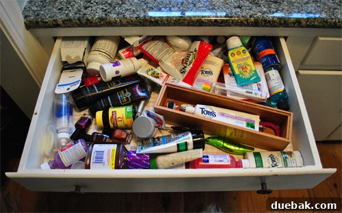 Clutter-Free Bathroom Drawers 2 Cluttered bathroom drawer before organization