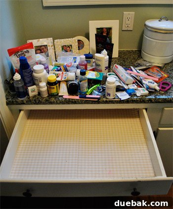Clutter-Free Bathroom Drawers 4 All items removed from the drawer, laid out for sorting and decluttering
