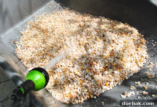 Dirty water draining from washed pea gravel