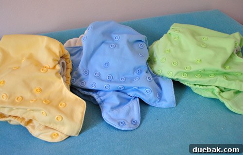 Cloth diapers after two years of use, showcasing their excellent condition and vibrant colors