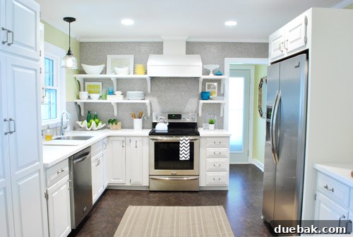 Stylishly organized open kitchen shelves displaying regularly used dishes and decor, enhancing kitchen accessibility