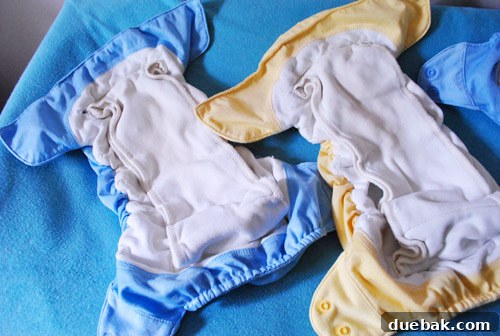 Inside view of a well-maintained cloth diaper, demonstrating fabric and snap integrity after extended use