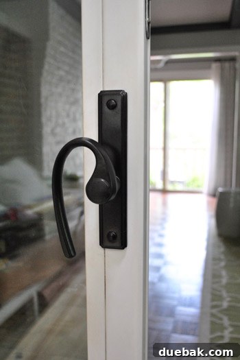 Oil-rubbed bronze hardware on a sunroom slider, demonstrating exceptional durability with daily use