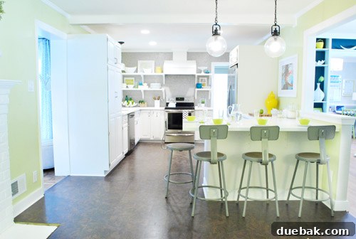 Modern kitchen lab stools with a flexible backrest positioned at a kitchen island, perfect for daily tasks