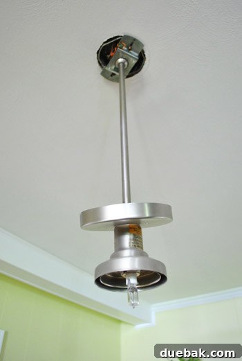 Old pendant light removed from ceiling