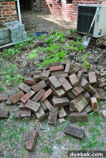 Pile of bricks and pavers after clearing the AC shrine