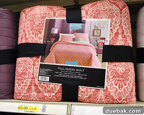 Coral quilt with subtle tribal-inspired detailing, offering a sophisticated and designer-like aesthetic.